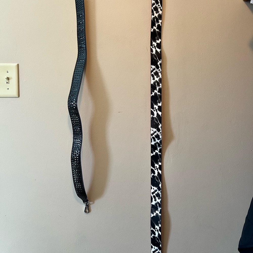 Purse straps. One is 42” long and leopard print, other faux patent leather 32”.